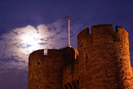 Here is a photo of the west tower with a full moon hidden behind a cloud.