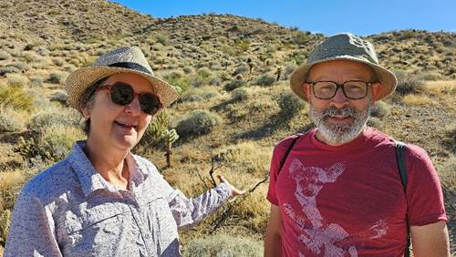 Couple wearing hats in the desert